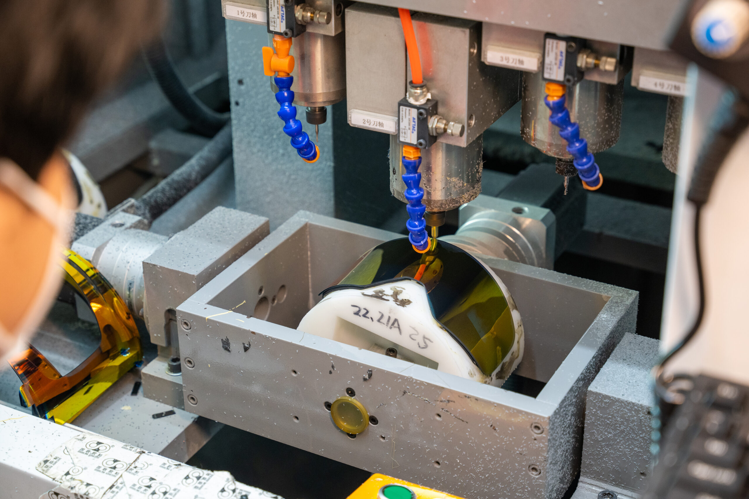 Precision cutting of sunglass lenses